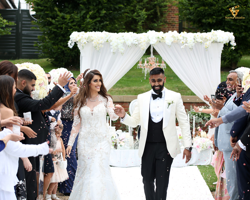 Iranian-wedding-photographer-The-Grove 
 Persian Bride and groom walking away from Sofreh Aghd as married couple at beautiful The Grove. Photographer By Hamid Saboury Persian wedding photographer in Uk 
 Keywords: Persian wedding London, Iranian wedding photographer, Sofre Aghd.